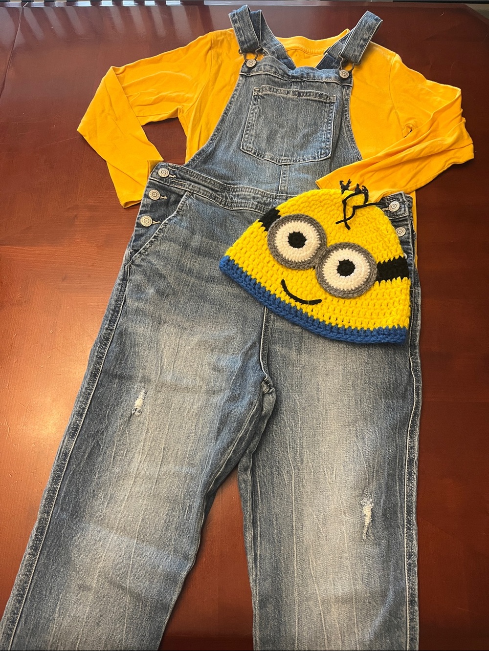 Cat & Jack Yellow Top with Blue Denim Overalls with minion knit beanie.
